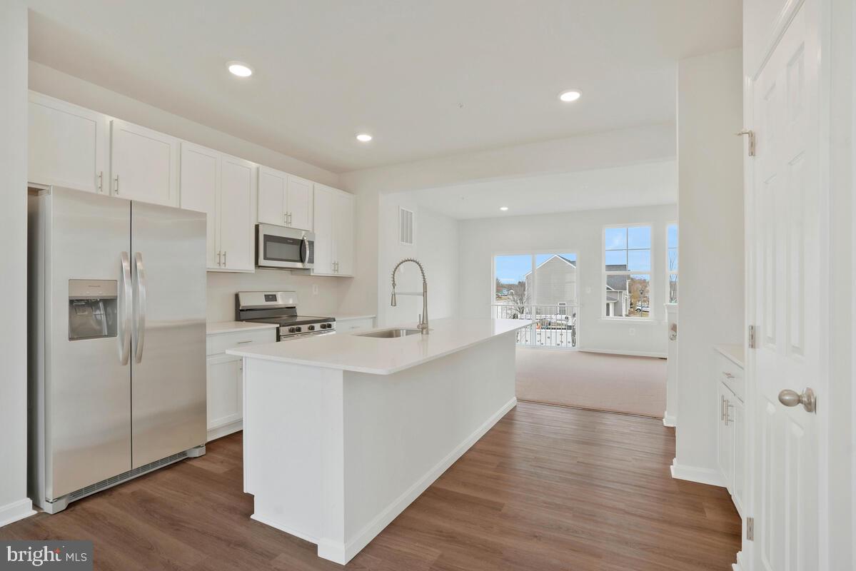284 Topher's Trail Prince Frederick, MD 20678 - Photo 6 of 16 Bright and modern kitchen space.