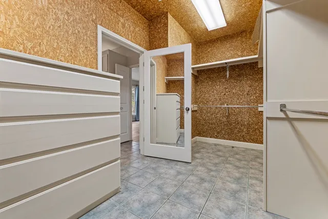 a view of an empty walk in closet