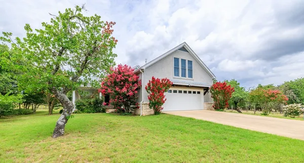 front view of house with a yard
