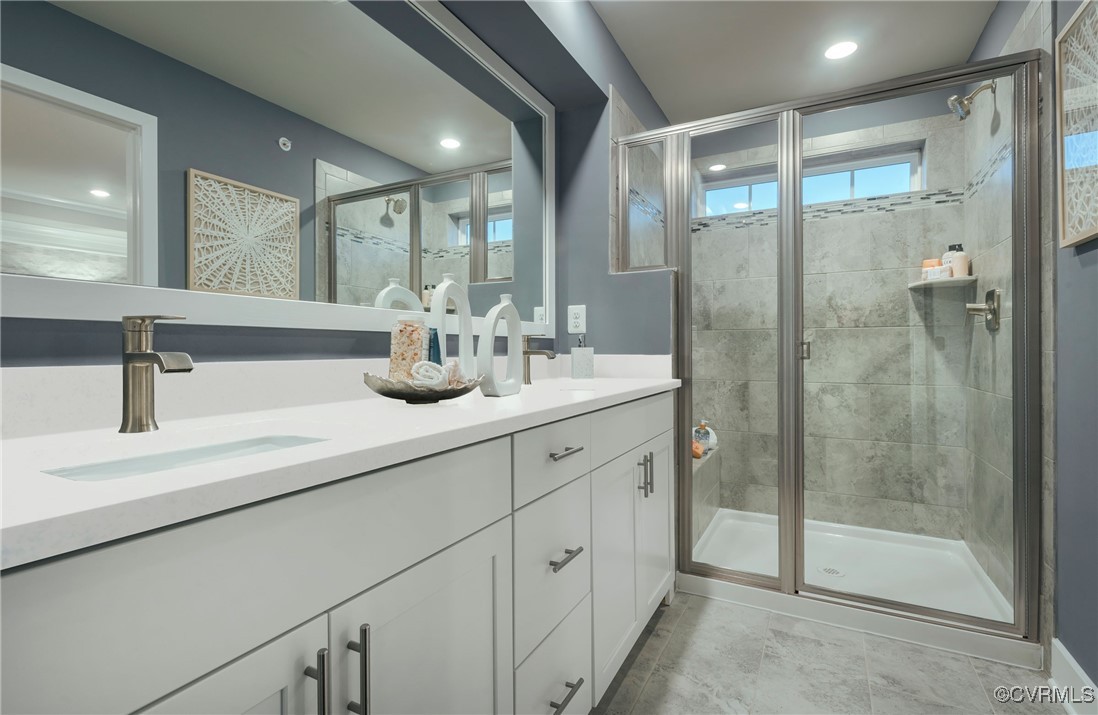 16017 Abelson Way Chesterfield, VA 23832 - Photo 2 of 21 a bathroom with double vanity sink and mirror