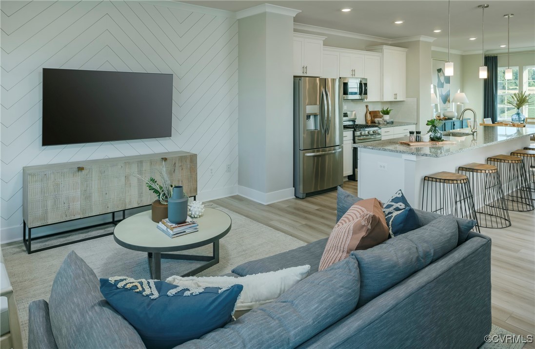 16017 Abelson Way Chesterfield, VA 23832 - Photo 9 of 21 a living room with furniture and a flat screen tv