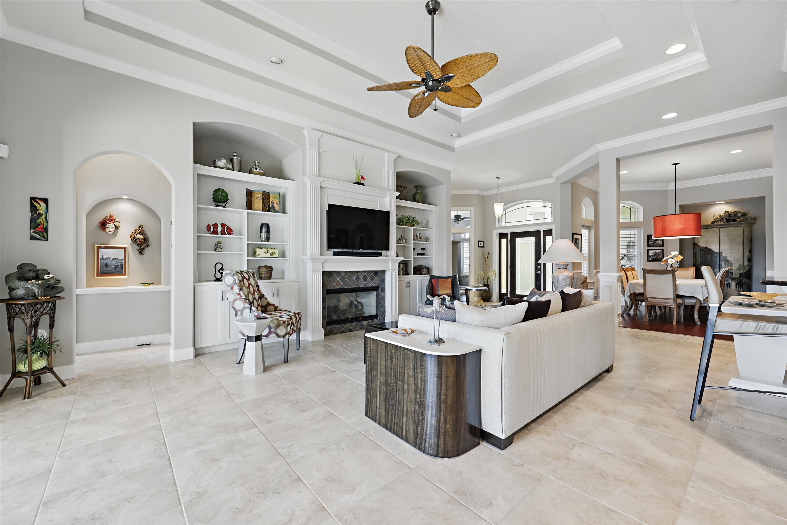 322 Fiddlers Point Drive St. Augustine, FL 32080 - Photo 11 of 58 a living room with furniture and a flat screen tv