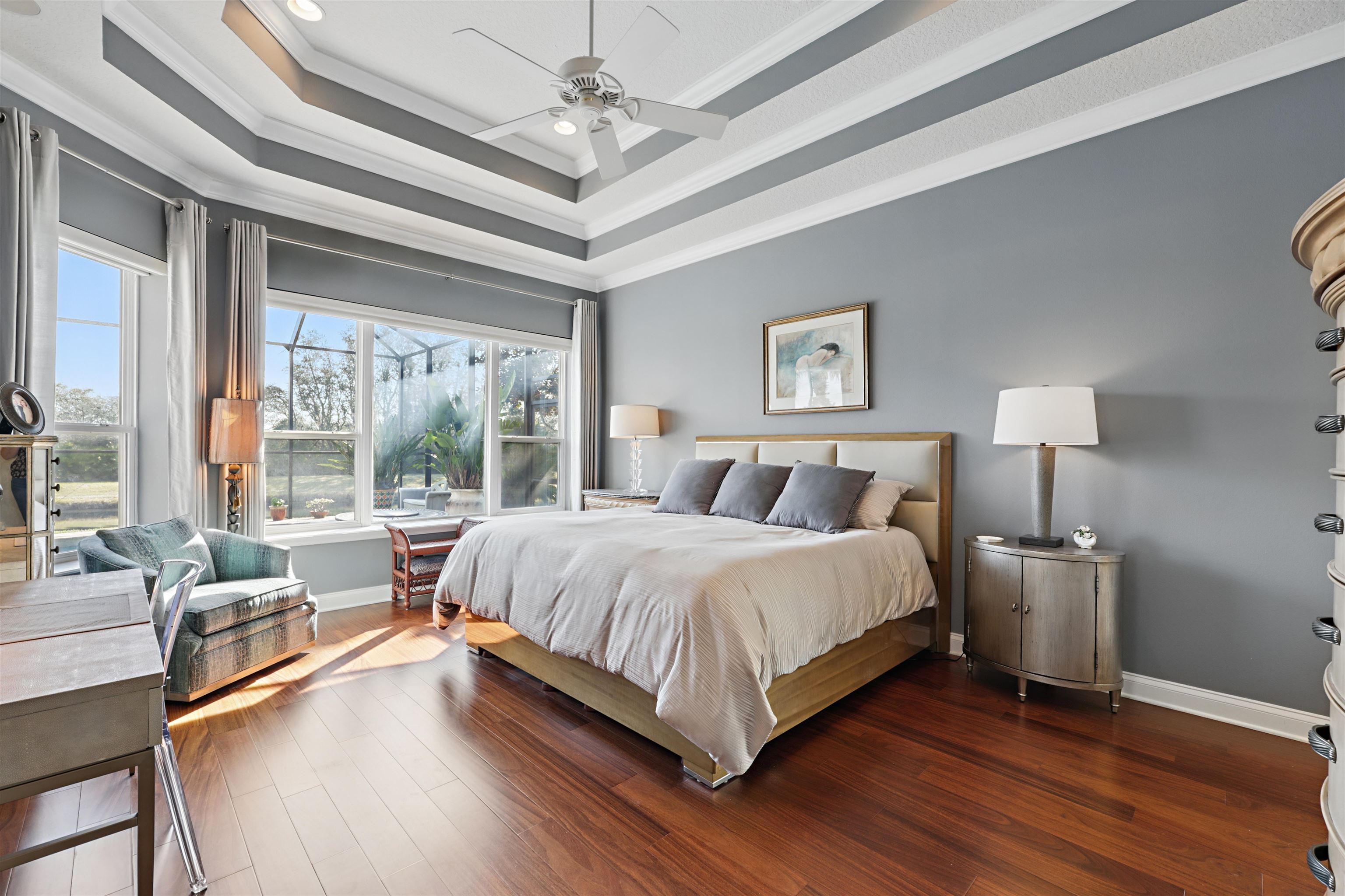 322 Fiddlers Point Drive St. Augustine, FL 32080 - Photo 20 of 58 a spacious bedroom with a bed and a large window