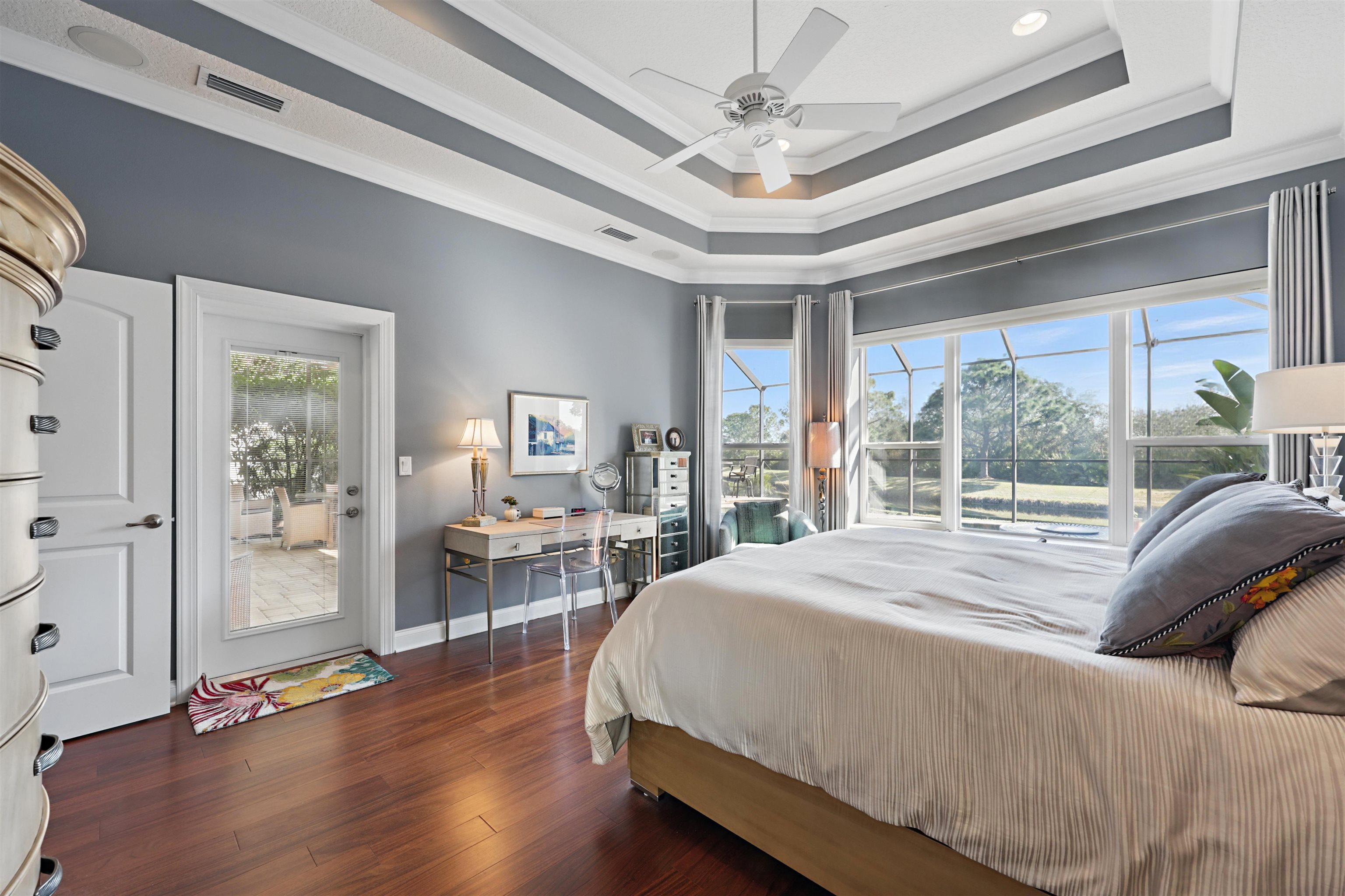 322 Fiddlers Point Drive St. Augustine, FL 32080 - Photo 23 of 58 a bed sitting in a spacious bedroom next to a window