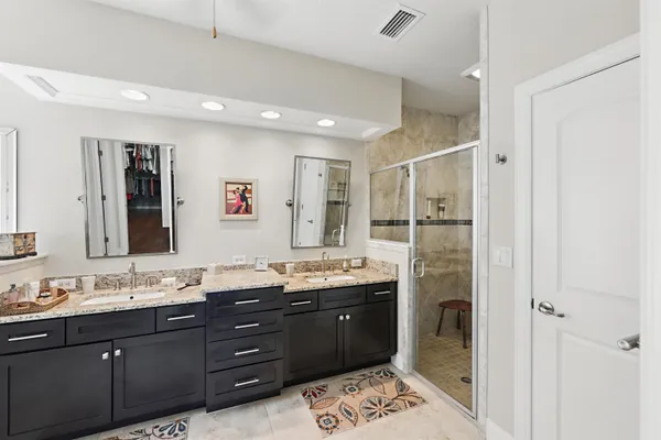 a bathroom with a bathtub and a sink