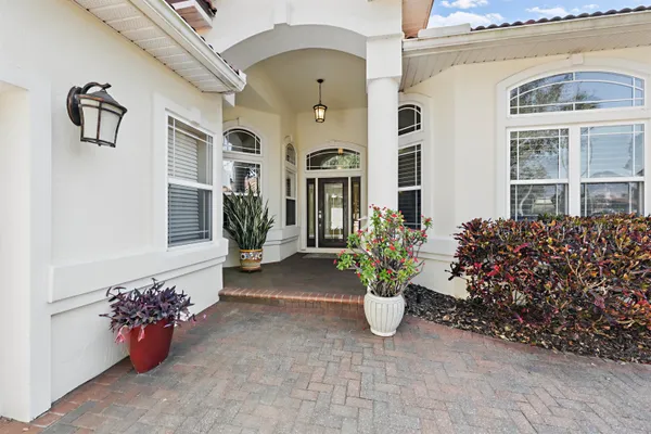 a view of a bunch of flowers in front of a house