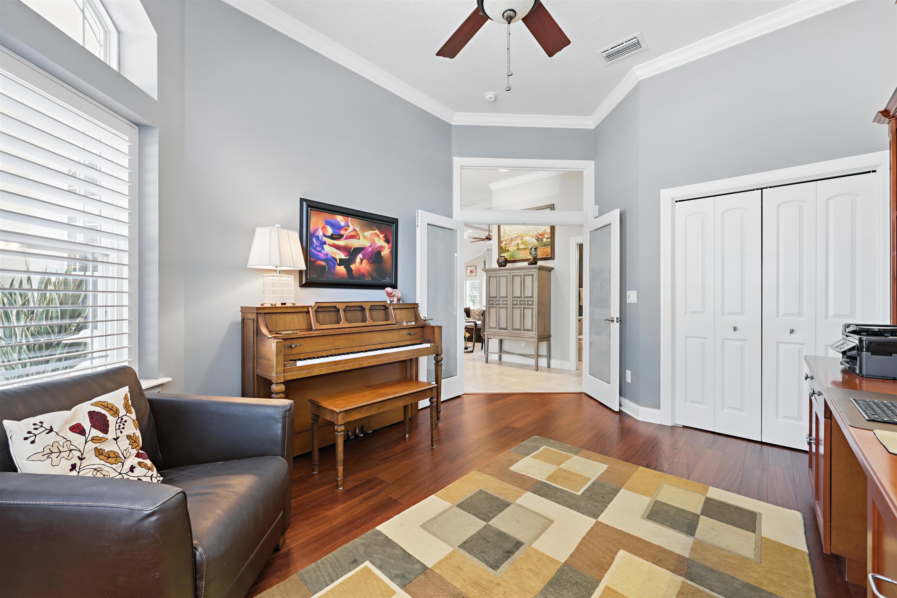 322 Fiddlers Point Drive St. Augustine, FL 32080 - Photo 36 of 58 a living room with furniture and a piano