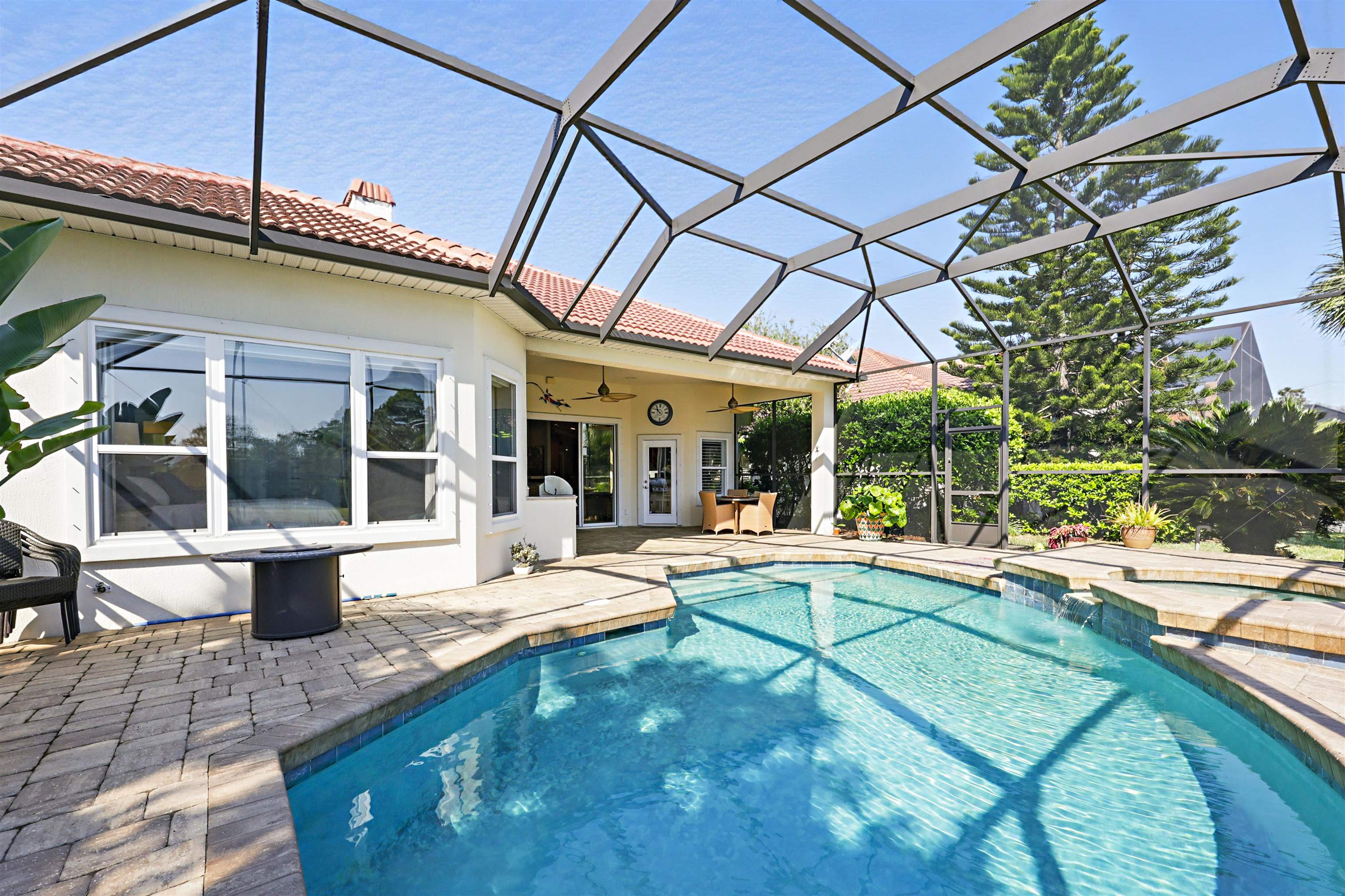 322 Fiddlers Point Drive St. Augustine, FL 32080 - Photo 44 of 58 a view of a house with a backyard patio and swimming pool