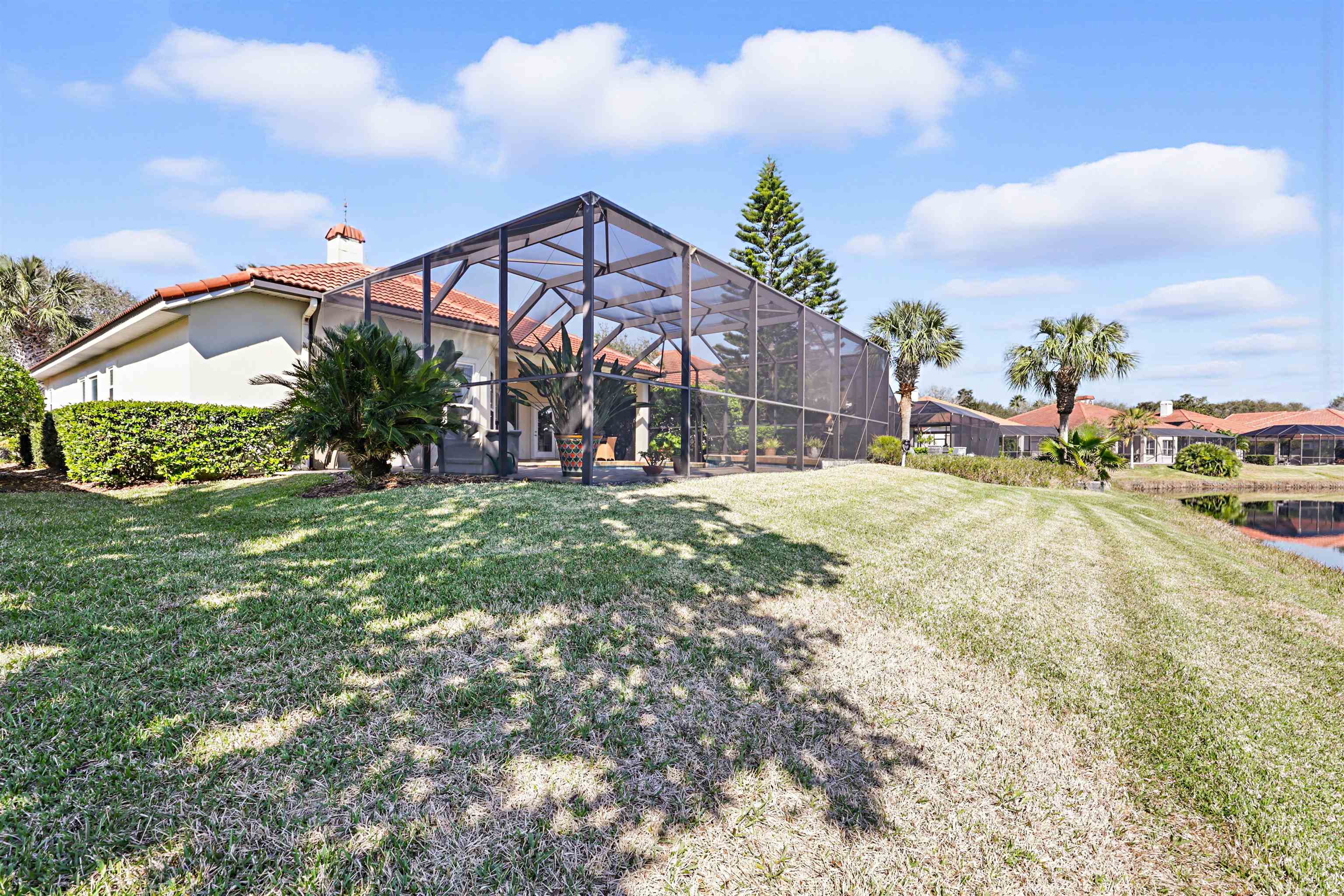 322 Fiddlers Point Drive St. Augustine, FL 32080 - Photo 49 of 58 a view of a house with a yard