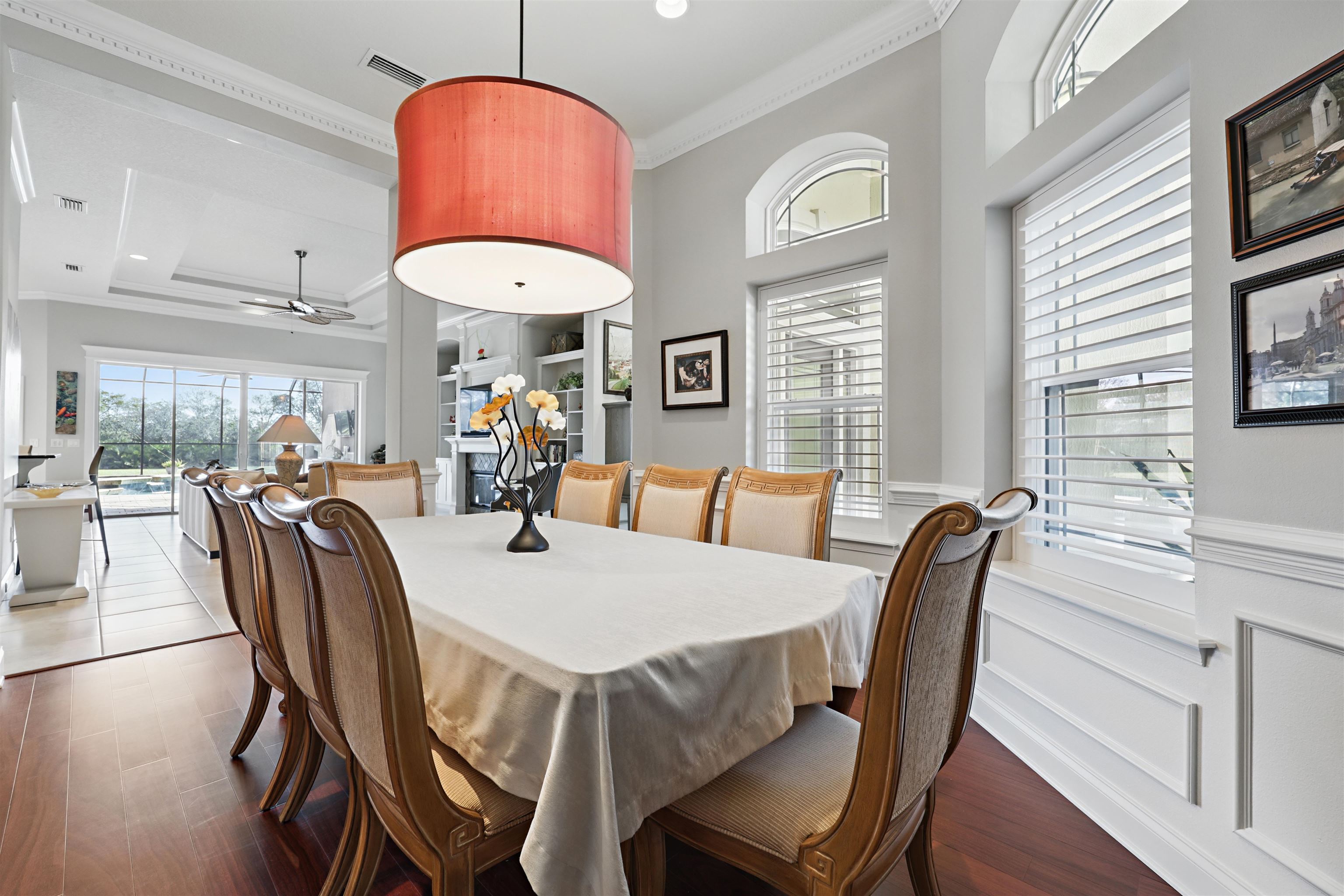 322 Fiddlers Point Drive St. Augustine, FL 32080 - Photo 7 of 58 a view of a a dining room with furniture window and wooden floor