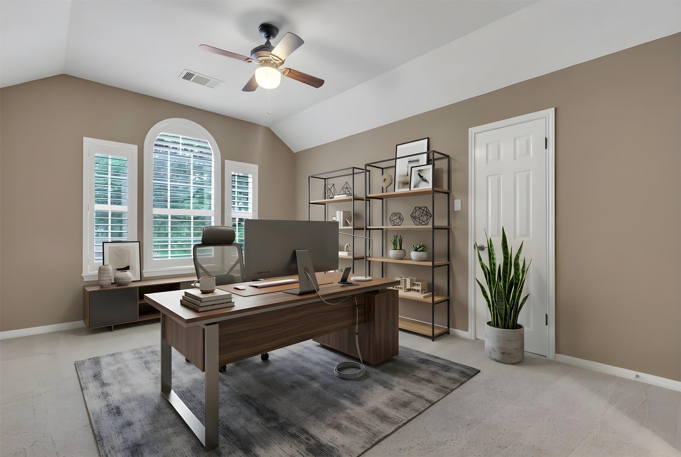 6008 Tributary Ridge Court Austin, TX 78759 - Photo 28 of 36 Secondary Bedroom #3. Virtually staged as office. Large spacious bedroom staged as a quiet home office features vaulted ceilings, ample natural light, and plenty of space for productivity.