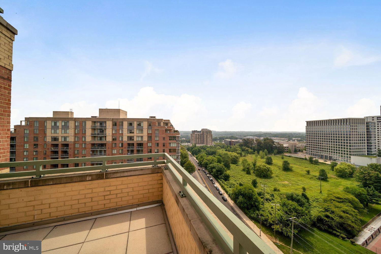 11700 Old Georgetown Road, Unit 1405 North Bethesda, MD 20852 - Photo 16 of 17 a view of city with tall buildings