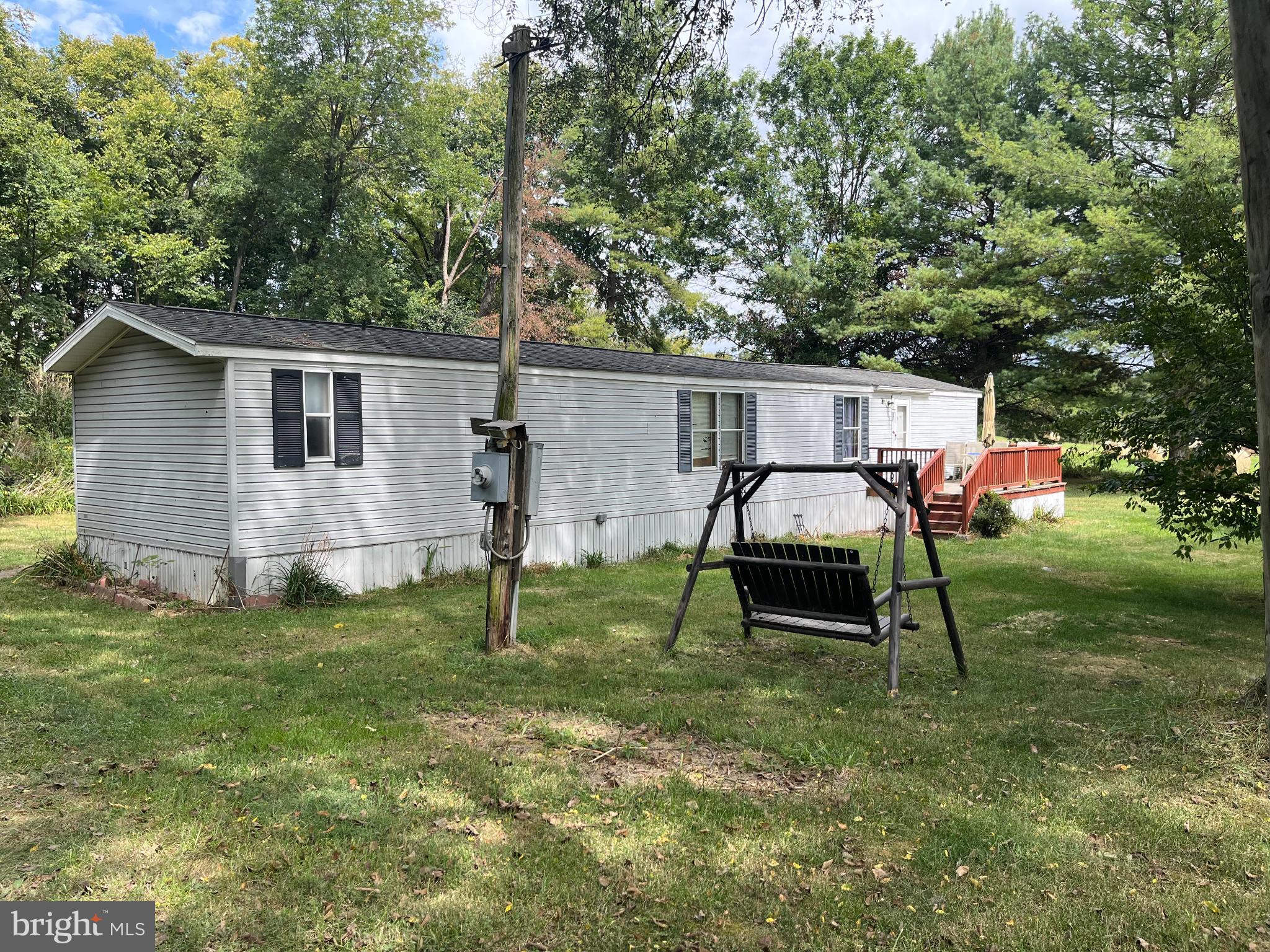 291 Dean Road Toms Brook, VA 22660 - Photo 1 of 21 Charming mobile home nestled in nature's embrace.