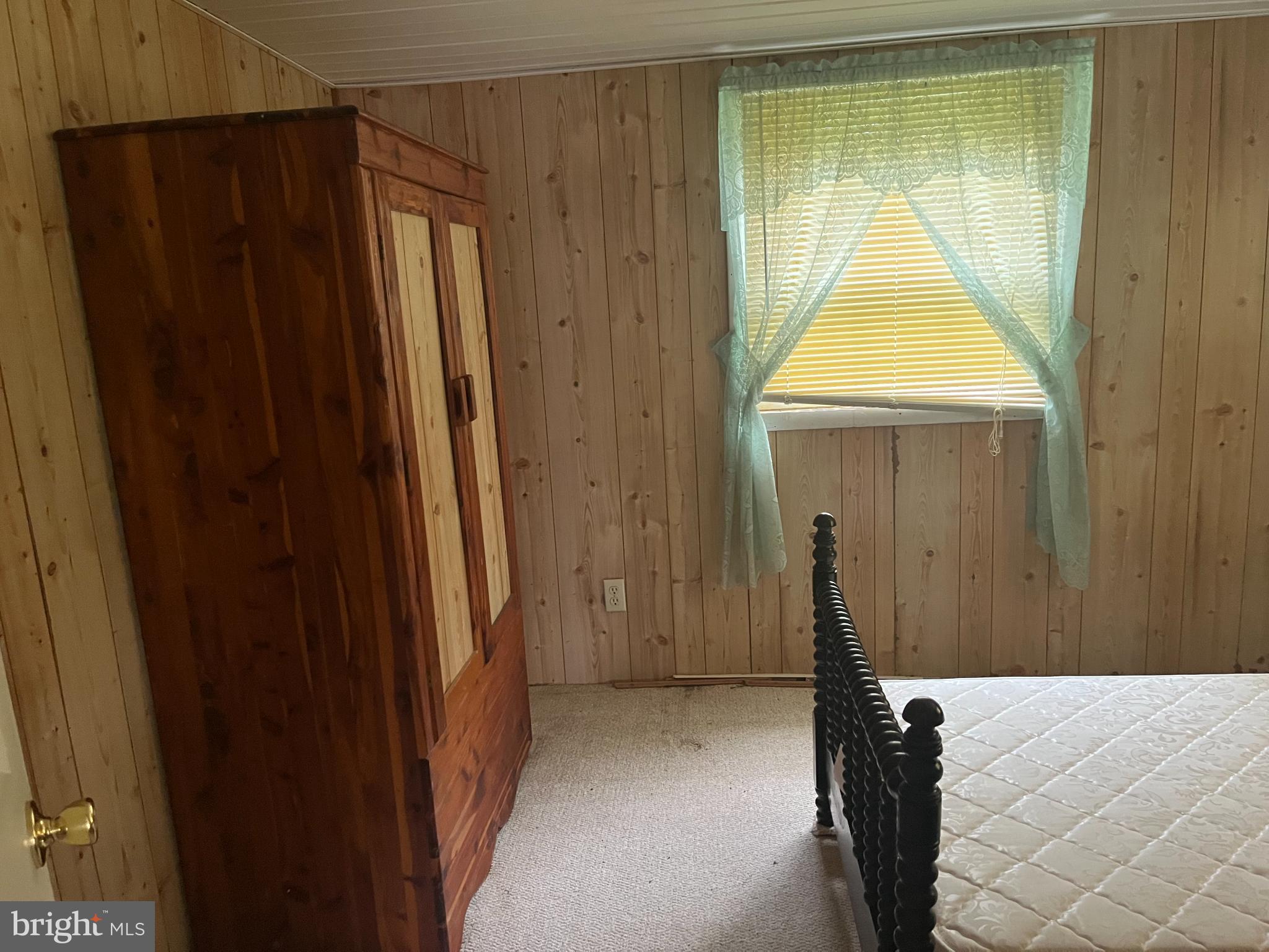 291 Dean Road Toms Brook, VA 22660 - Photo 17 of 21 Cozy room with natural light and wood accents.