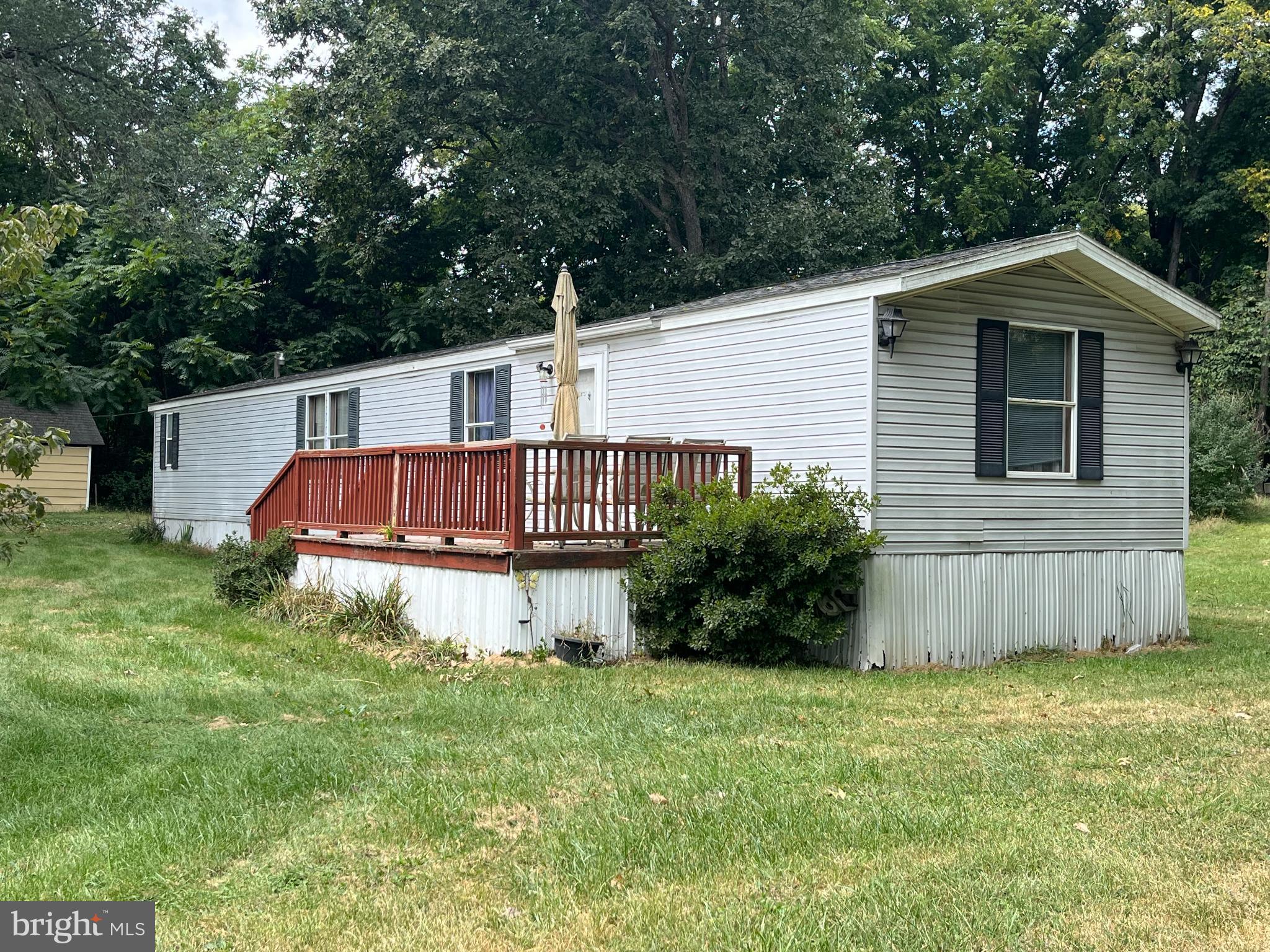 291 Dean Road Toms Brook, VA 22660 - Photo 4 of 21 Charming mobile home with inviting deck.
