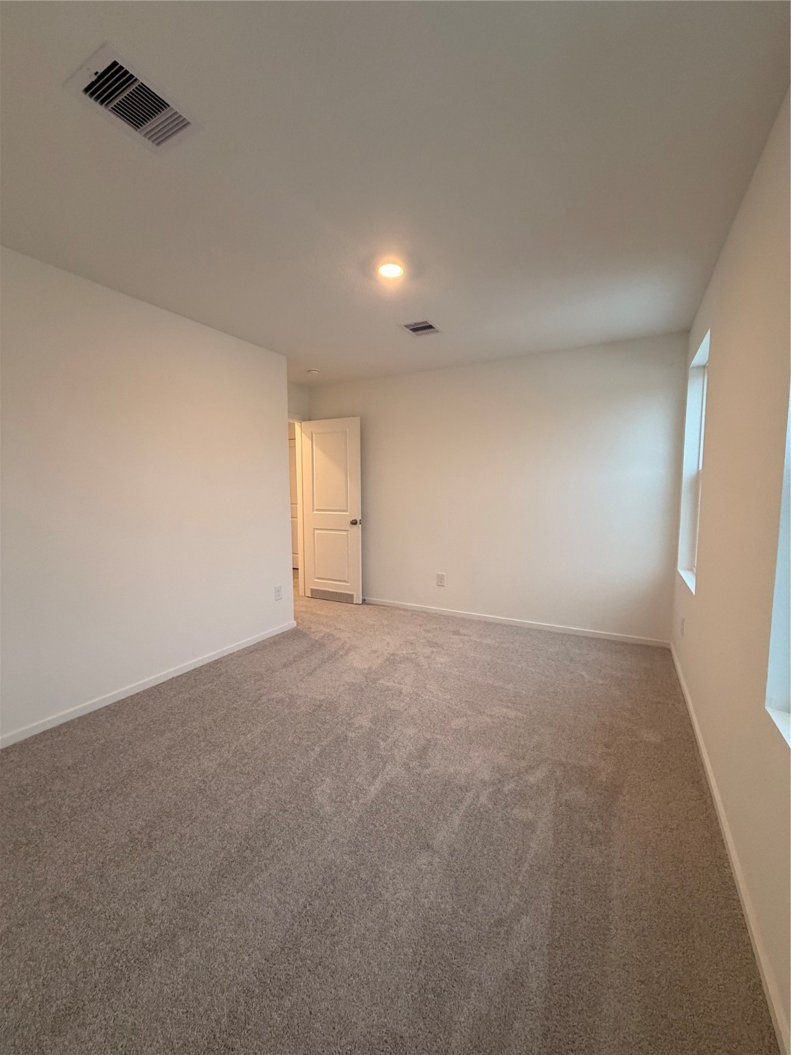 1719 West Stroker Road Crosby, TX 77532 - Photo 11 of 29 a view of an empty room and a window