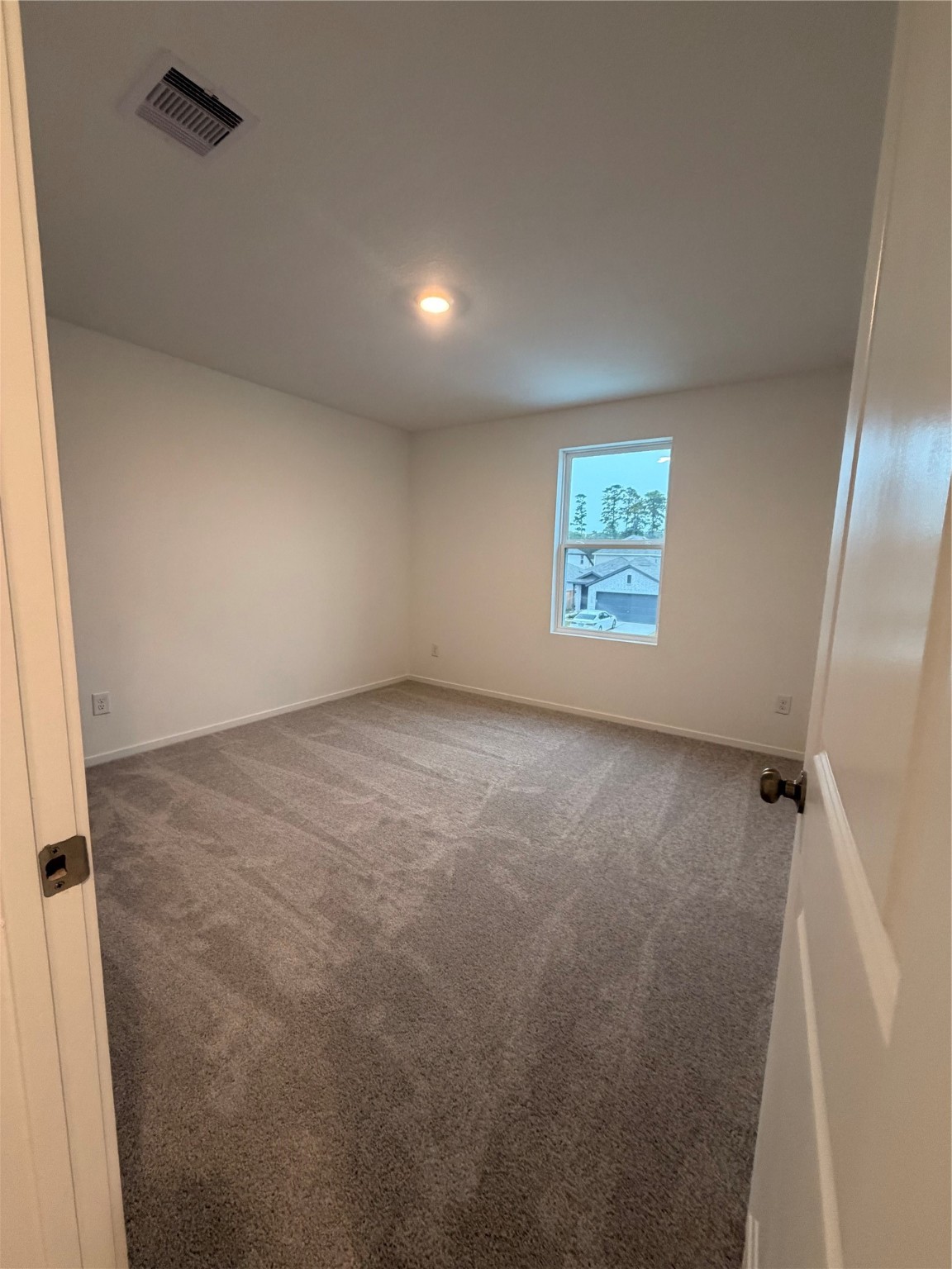 1719 West Stroker Road Crosby, TX 77532 - Photo 13 of 29 an empty room with windows