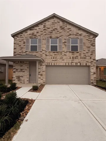 a front view of house with yard