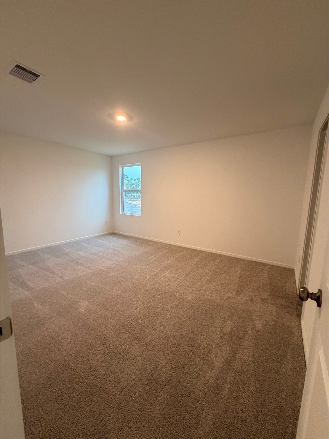 1719 West Stroker Road Crosby, TX 77532 - Photo 23 of 29 an empty room with windows