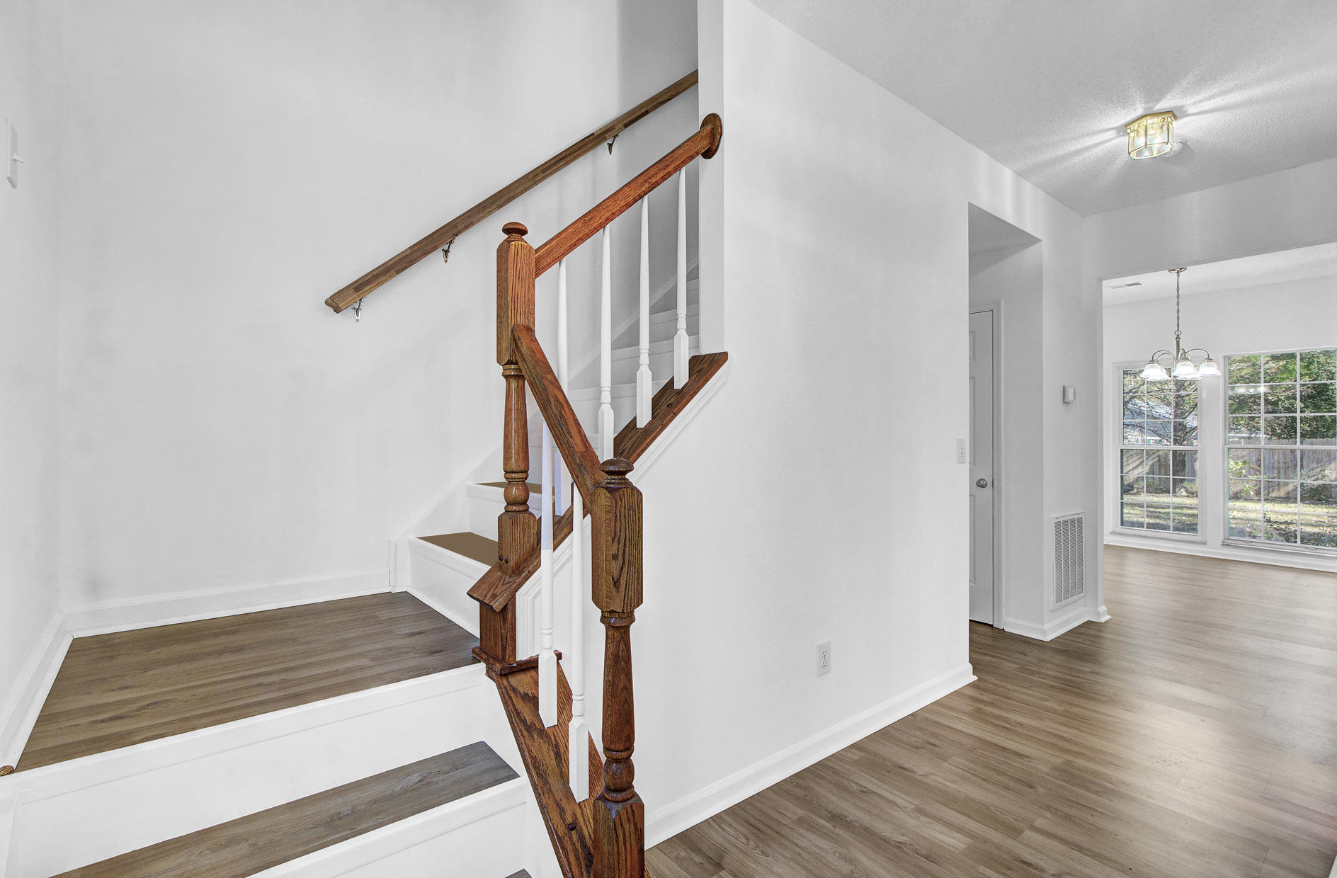 128 Whaler Road Summerville, SC 29485 - Photo 22 of 45 Stairwell off formal living
