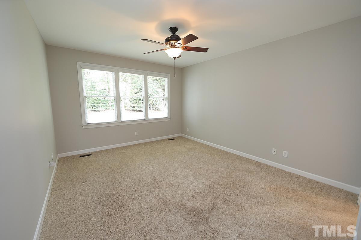 6317 Belle Crest Drive Raleigh, NC 27612 - Photo 12 of 29 an empty room with a window