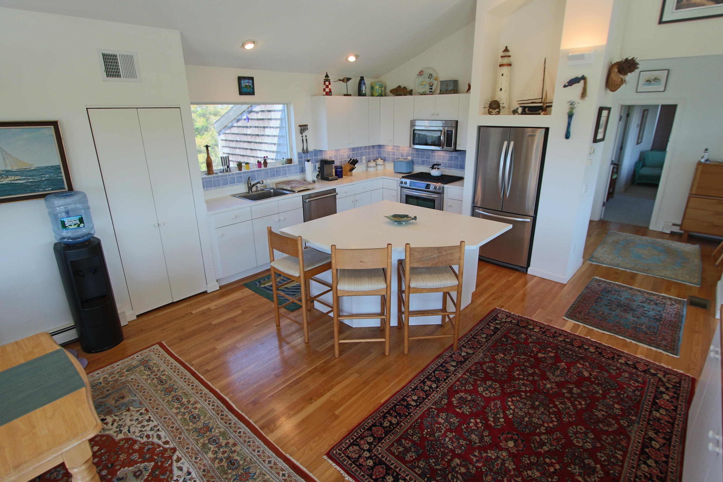11 Avocet Road Truro, MA 02666 - Photo 8 of 35 a view of a dining room with furniture