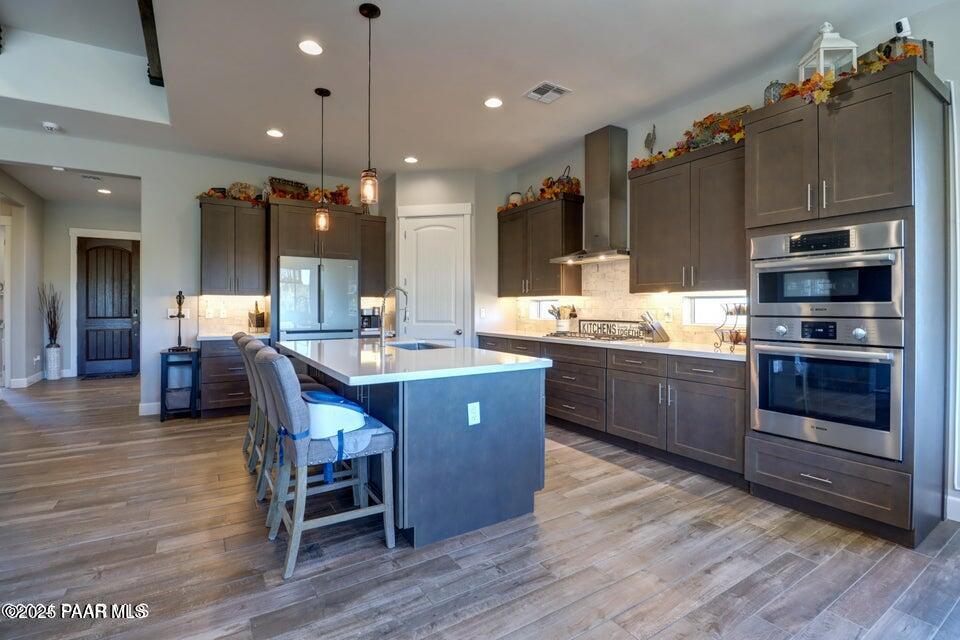 5505 Corliss Circle Prescott, AZ 86305 - Photo 5 of 12 a kitchen with a sink appliances and cabinets
