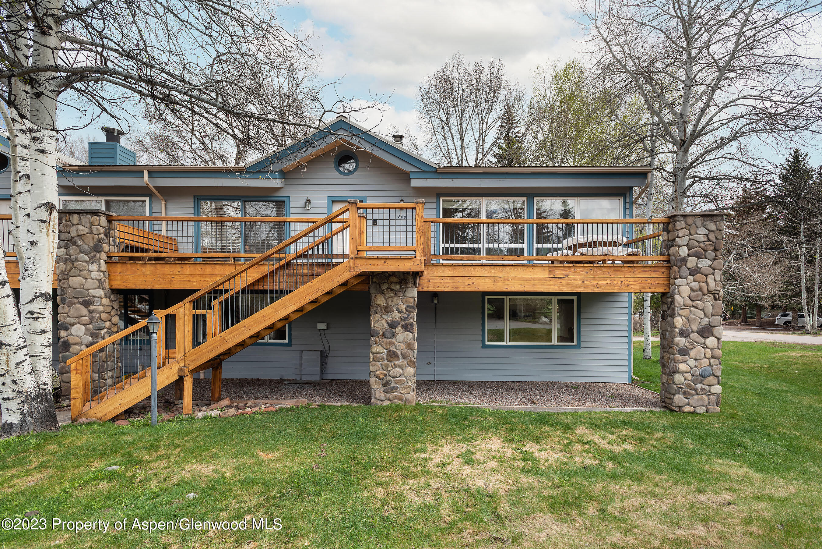 800 Bonita Drive, Unit 1 Aspen, CO 81611 - Photo 18 of 18 a front view of a house with a yard