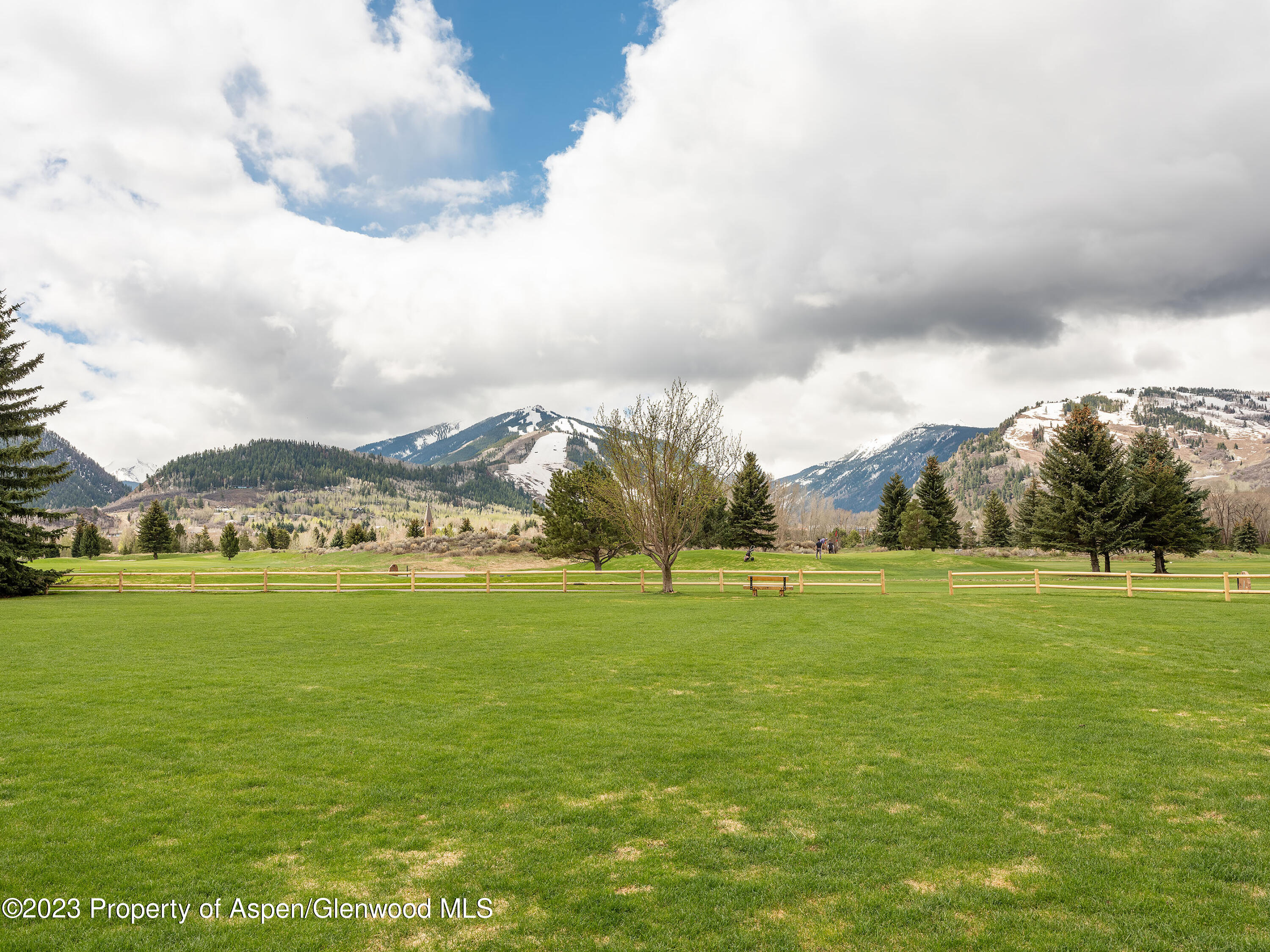 800 Bonita Drive, Unit 1 Aspen, CO 81611 - Photo 5 of 18 a view of an ocean and a yard
