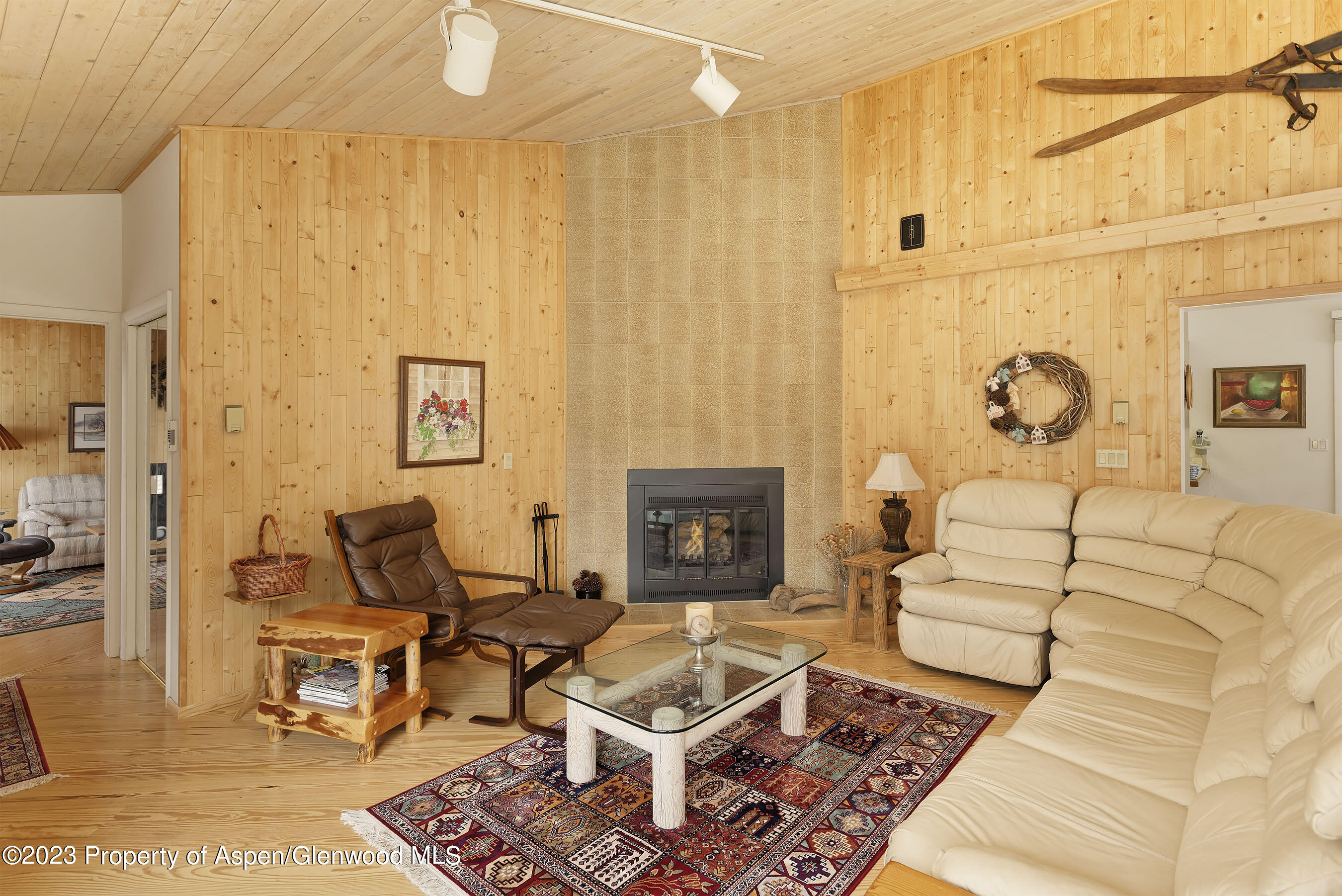 800 Bonita Drive, Unit 1 Aspen, CO 81611 - Photo 6 of 18 a living room with furniture and a fireplace