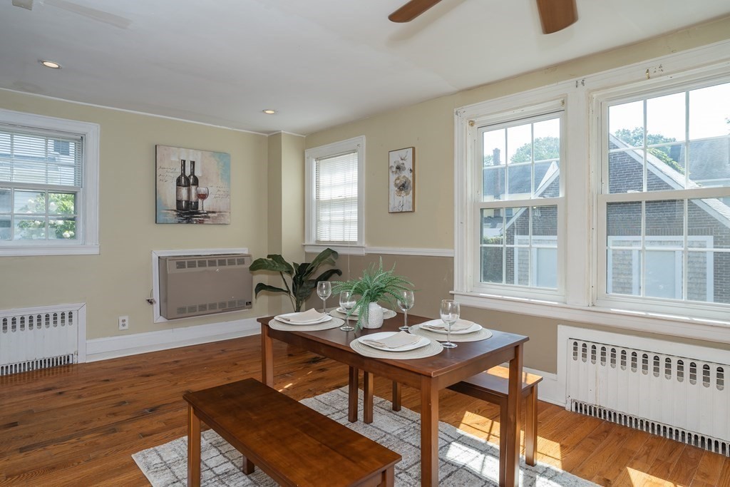 35 Bronson Terrace Springfield, MA 01108 - Photo 12 of 39 a view of a dining room with furniture window and wooden floor