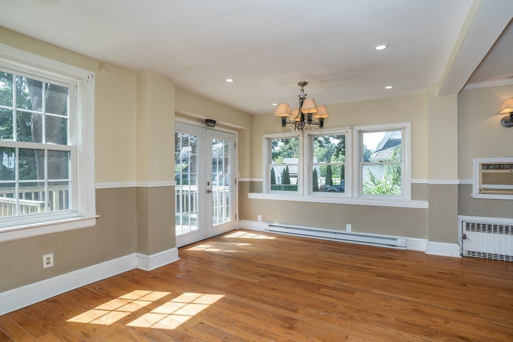 35 Bronson Terrace Springfield, MA 01108 - Photo 14 of 39 an empty room with wooden floor and windows