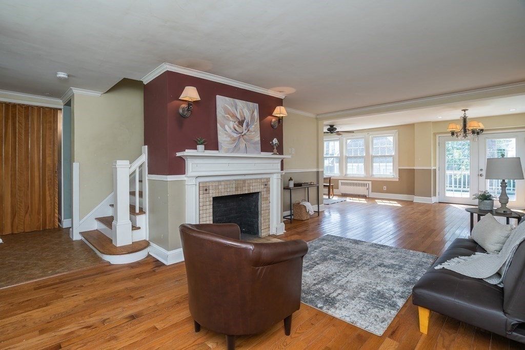 35 Bronson Terrace Springfield, MA 01108 - Photo 18 of 39 a living room with furniture and a fireplace