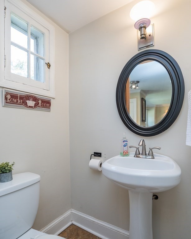 35 Bronson Terrace Springfield, MA 01108 - Photo 21 of 39 a bathroom with a sink and a mirror