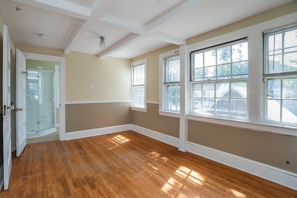 35 Bronson Terrace Springfield, MA 01108 - Photo 27 of 39 wooden floor in an empty room with a window