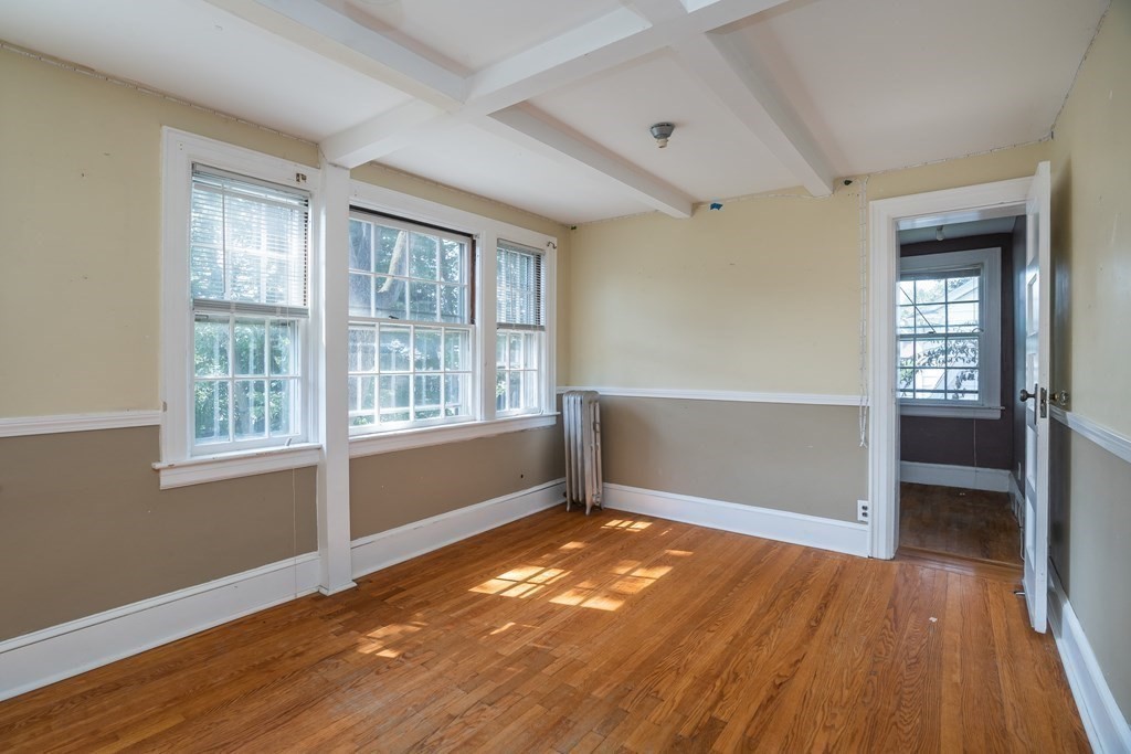35 Bronson Terrace Springfield, MA 01108 - Photo 28 of 39 an empty room with wooden floor and windows