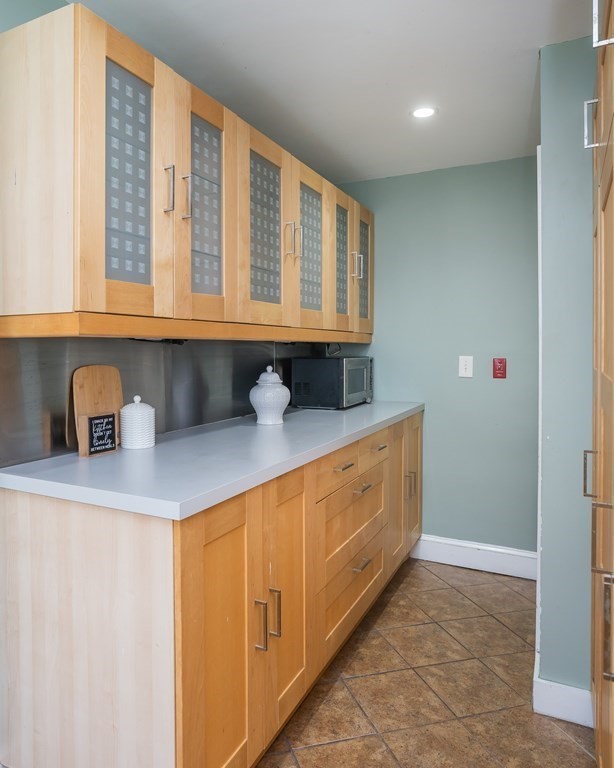 35 Bronson Terrace Springfield, MA 01108 - Photo 6 of 39 a bathroom with a sink and a mirror