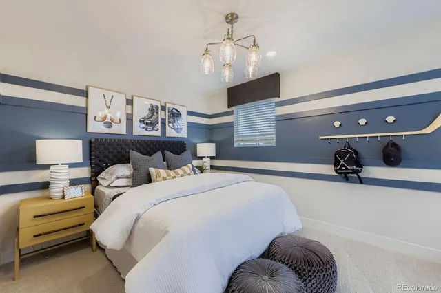 a spacious bedroom with a bed and window