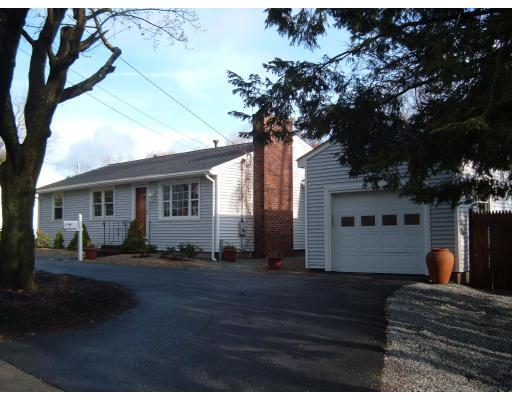 44 Great Road Maynard, MA 01754 - Photo 1 of 19 a front view of a house with a yard