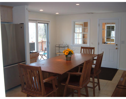 44 Great Road Maynard, MA 01754 - Photo 6 of 19 a view of a dining room with furniture and window
