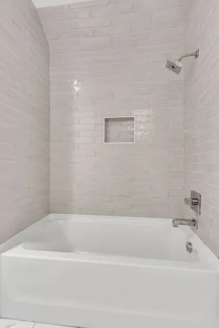 a bathroom with a bathtub