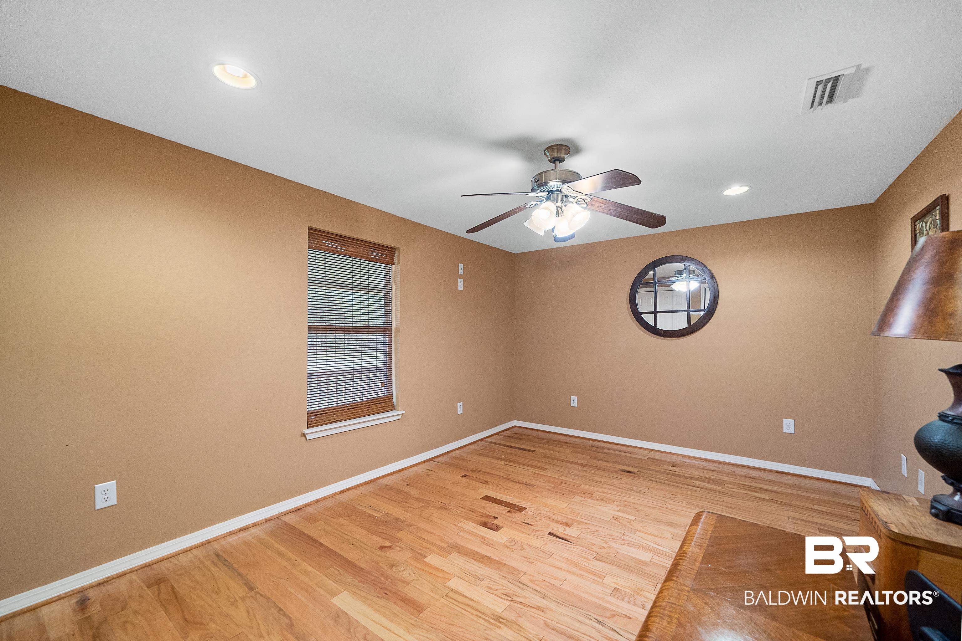 11528 Whitehouse Fork Road Bay Minette, AL 36507 - Photo 15 of 37 Empty room with recessed lighting, light wood-style floors, and ceiling fan