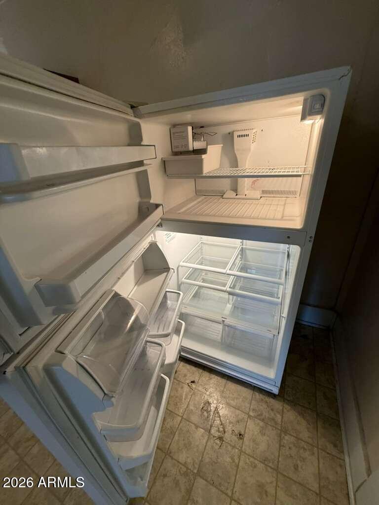 1014 East 14th Street Douglas, AZ 85607 - Photo 14 of 38 a view of walk in closet with empty racks