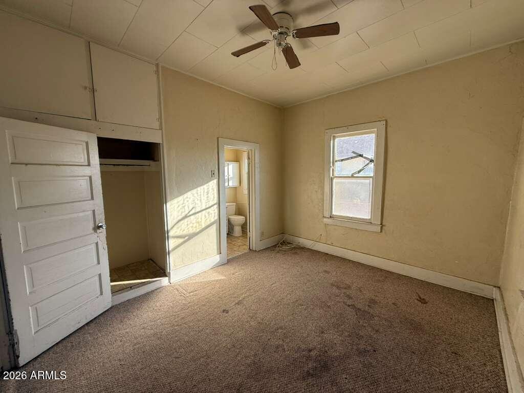 1014 East 14th Street Douglas, AZ 85607 - Photo 16 of 38 a view of a livingroom with an empty space and a window