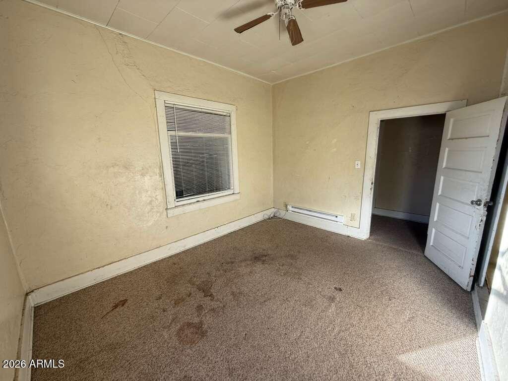 1014 East 14th Street Douglas, AZ 85607 - Photo 17 of 38 a view of an empty room with a window