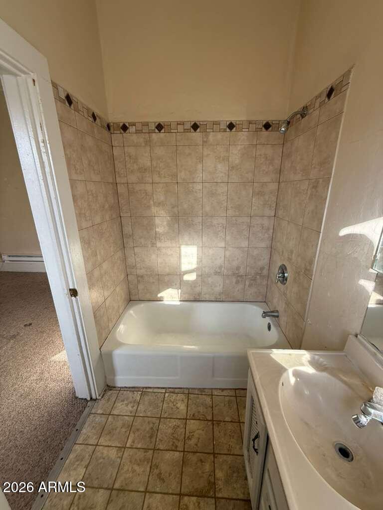1014 East 14th Street Douglas, AZ 85607 - Photo 20 of 38 a bathroom with a sink a toilet and shower