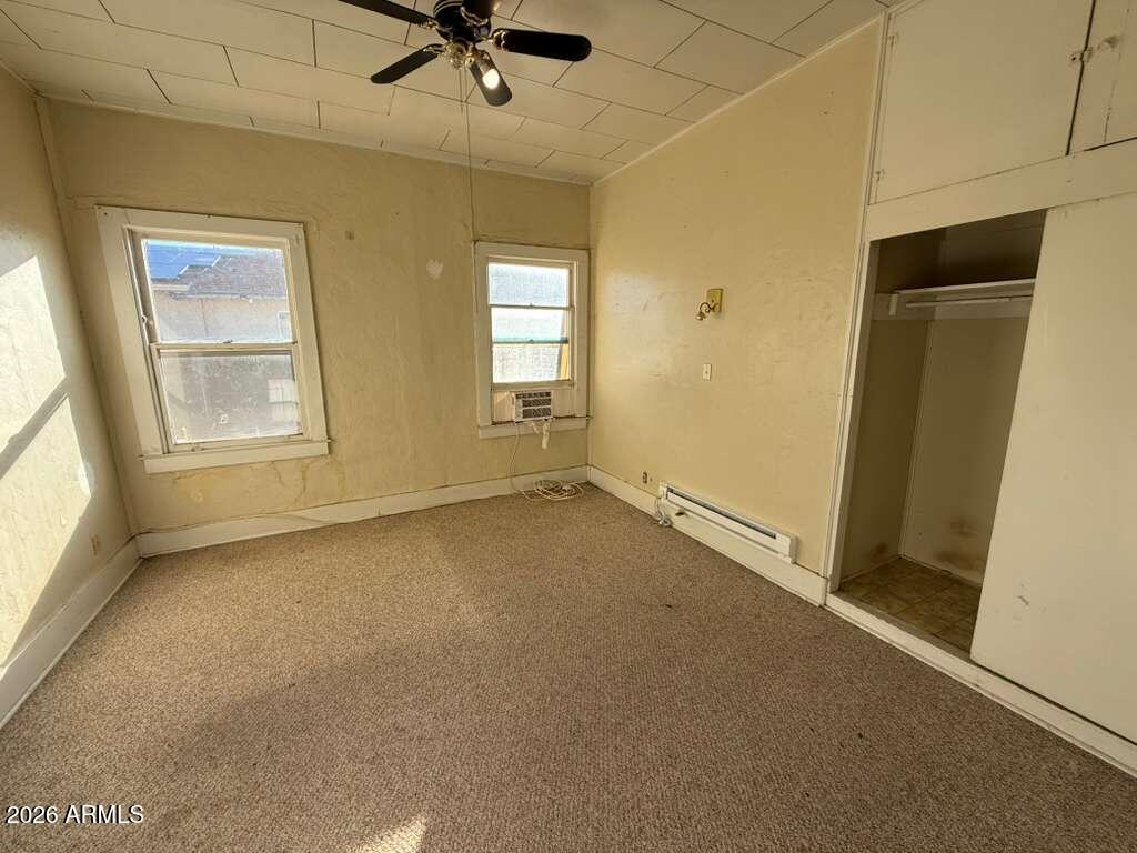 1014 East 14th Street Douglas, AZ 85607 - Photo 21 of 38 an empty room with windows and entrance
