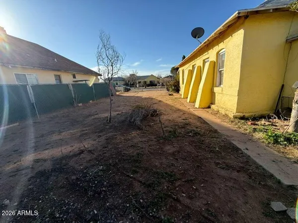 a front view of a house with yard