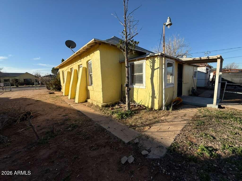 1014 East 14th Street Douglas, AZ 85607 - Photo 36 of 38 a front view of a house with yard