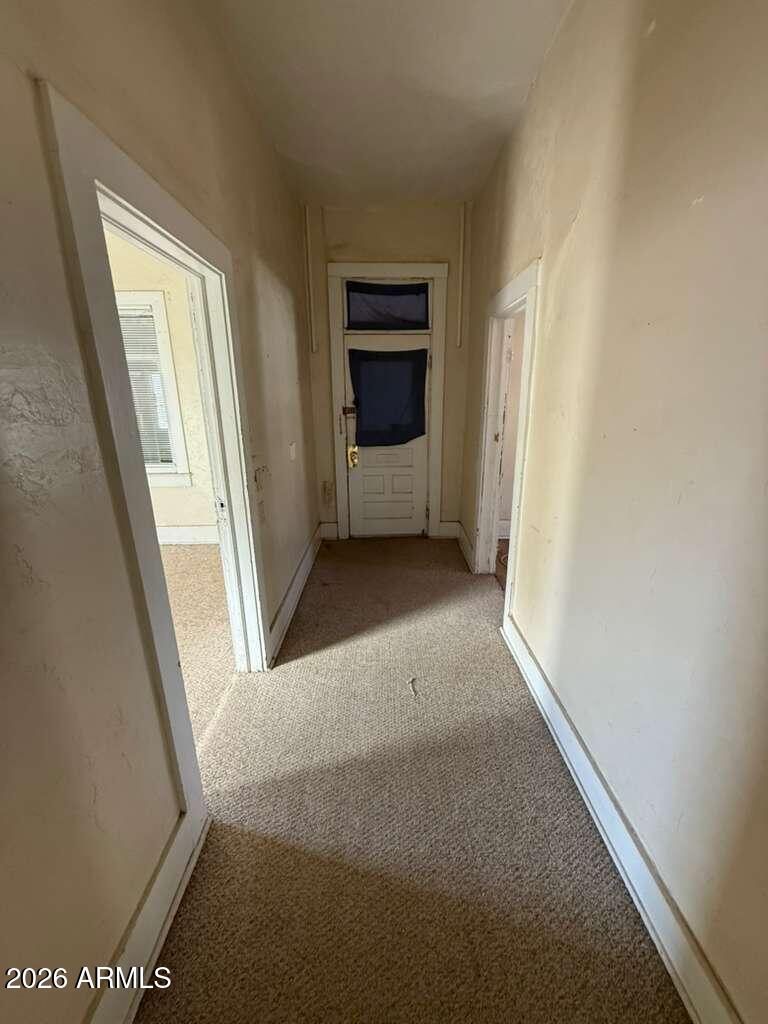 1014 East 14th Street Douglas, AZ 85607 - Photo 7 of 38 a view of a room with a hallway